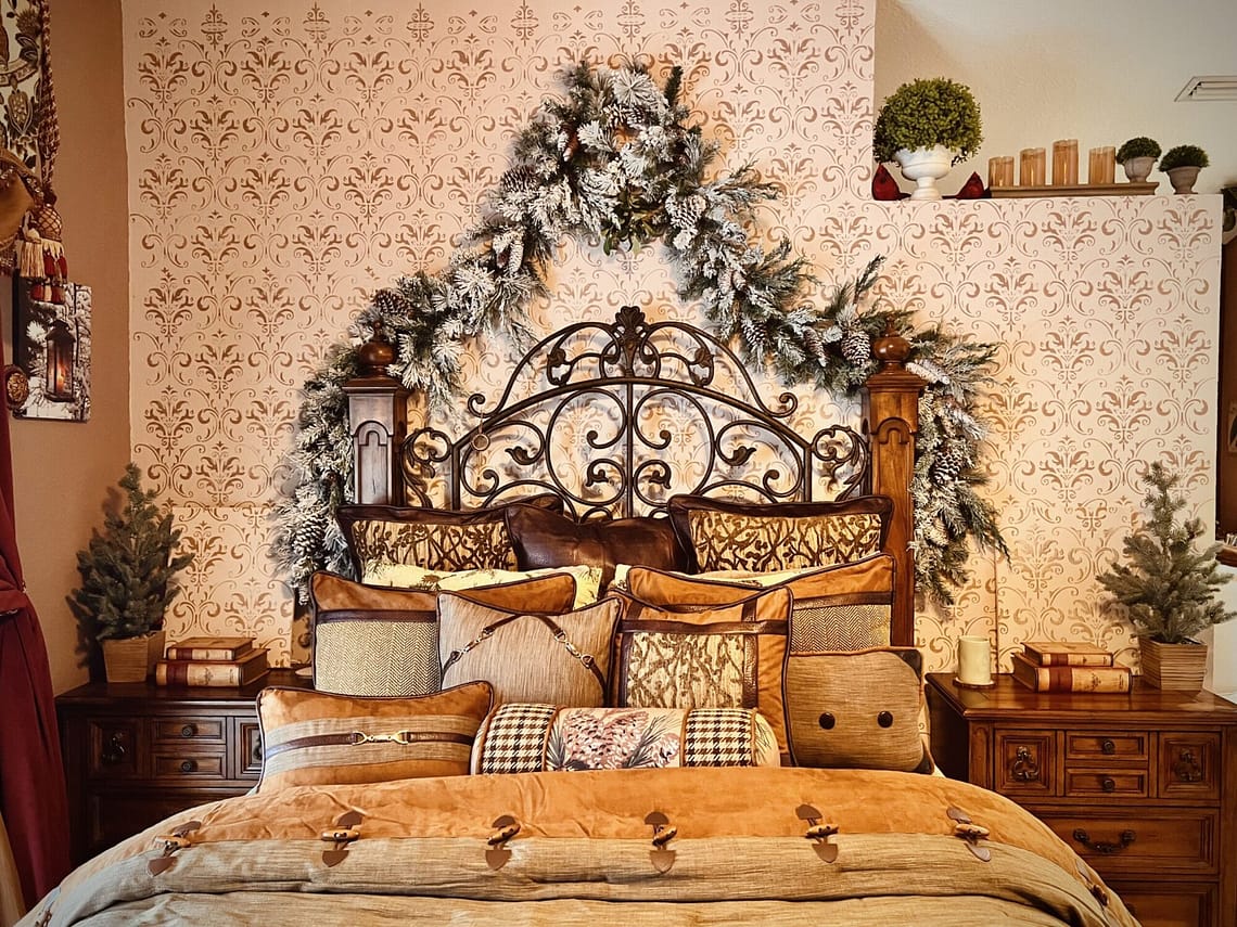 rustic lodge cabin luxury bedding dark antique walnut bedroom furniture wrought iron accents christ mas decor candles led lighting orchids home decor