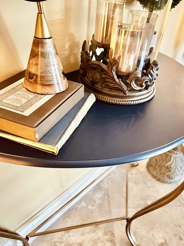 brown half moon console table metal legs painted navy blue and gold GILDING WAX gg collection
