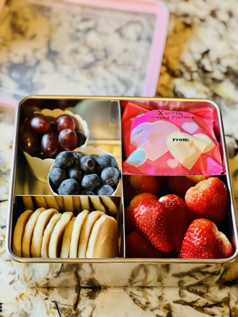bento box lunch valentine's day theme fruit in cupcake liners mini pancakes utz mini pretzel snack bag