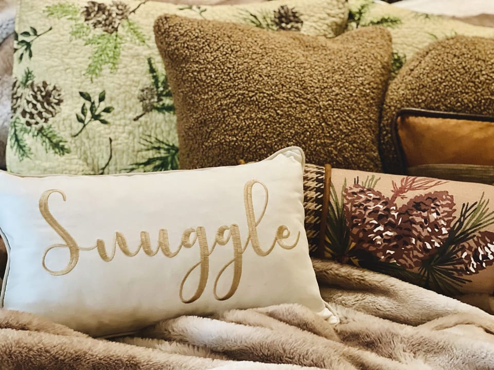 cozy winter snuggle pillows pinecone bed décor